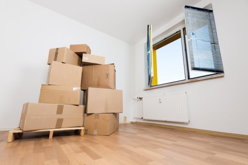 Packed boxes and furniture ready for transport in a Barnsbury home move