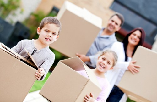 Careful loading of household furniture into a removals van