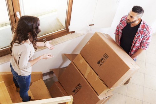 Professional movers handling boxes and office items in Barnsbury
